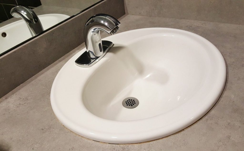 closeup of white vanity sink
