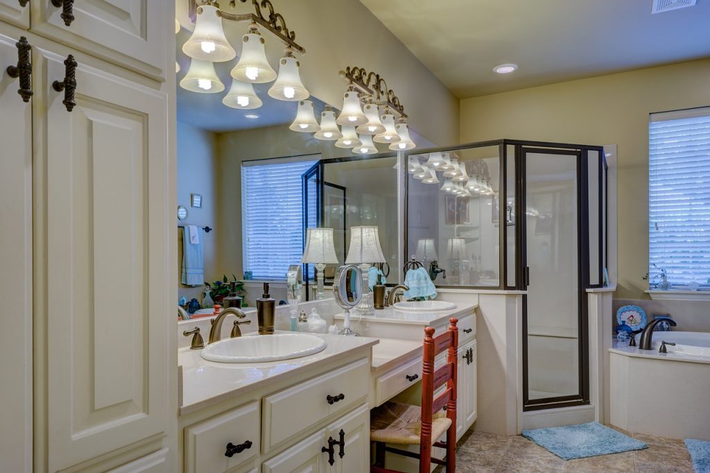 fancy bathroom with installed shower door