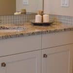 bathroom vanity with marble countertop